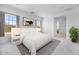Stylish main bedroom with neutral decor, plush carpet, bright windows, and a luxurious, comfortable feel at 8318 W Palo Verde Dr, Glendale, AZ 85305