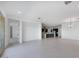 Expansive living area with tile flooring, neutral walls, and abundant natural light, creating a versatile space at 8318 W Palo Verde Dr, Glendale, AZ 85305