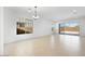 Spacious living area with tile flooring, recessed lighting, and large windows for ample natural light at 8318 W Palo Verde Dr, Glendale, AZ 85305