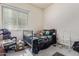 Bedroom with a window and chair at 839 E Leo Pl, Chandler, AZ 85249