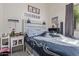 Bedroom with natural light from a window and neutral decor at 839 E Leo Pl, Chandler, AZ 85249