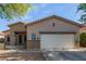 Inviting single-Gathering home featuring a two-car garage and desert landscaping for low maintenance appeal at 839 E Leo Pl, Chandler, AZ 85249