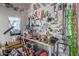 Well-stocked garage with tools and storage on the pegboard wall at 839 E Leo Pl, Chandler, AZ 85249