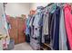 Walk-in closet featuring built-in storage and organized hanging space at 839 E Leo Pl, Chandler, AZ 85249