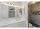 Bathroom with double sinks and glass shower at 9330 E Plana Ave, Mesa, AZ 85212