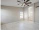Large bedroom with ceiling fan and window at 9330 E Plana Ave, Mesa, AZ 85212