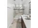 Clean, well-lit bathroom featuring a glass shower, sleek fixtures, and neutral tiling at 9532 E Knoll Cir, Mesa, AZ 85207