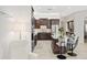 Well-appointed kitchen with granite island, stainless appliances, and a seamless flow at 9532 E Knoll Cir, Mesa, AZ 85207