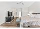 Main bedroom showcasing a king-sized bed, sleek furniture, and bright, airy atmosphere at 9532 E Knoll Cir, Mesa, AZ 85207