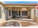 Comfortable covered patio featuring a dining area for outdoor relaxation and entertaining at 9532 E Knoll Cir, Mesa, AZ 85207