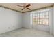 Bedroom featuring carpet floors, a ceiling fan and a window that offers natural light at 987 E Divot Dr, Tempe, AZ 85283