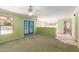 Large living room with access to the pool, ample space and access to the kitchen at 987 E Divot Dr, Tempe, AZ 85283