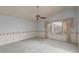 Spacious main bedroom featuring a ceiling fan and ample natural light at 987 E Divot Dr, Tempe, AZ 85283