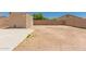 Backyard featuring block fence and a blank slate at 10009 W Bloch Rd, Tolleson, AZ 85353