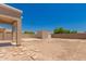 Spacious backyard with block fence and storage shed at 10009 W Bloch Rd, Tolleson, AZ 85353