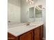 Bathroom featuring vanity and a mirror at 10009 W Bloch Rd, Tolleson, AZ 85353