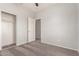 Neutral bedroom featuring a closet and carpeted floors at 10009 W Bloch Rd, Tolleson, AZ 85353