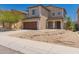 Charming two-story home with a well-manicured yard and a two-car garage at 10009 W Bloch Rd, Tolleson, AZ 85353