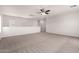 Upstairs loft area, perfect for a playroom, office, or secondary living space at 10009 W Bloch Rd, Tolleson, AZ 85353