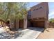 Charming two-story home with a well-manicured front yard and a two-car garage, creating a welcoming curb appeal at 10331 W Devonshire Ave, Phoenix, AZ 85037