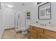 Bright bathroom with glass-enclosed shower and well-lit vanity at 1244 W Straford Ave, Gilbert, AZ 85233