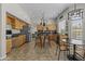 Bright kitchen features stainless steel appliances, central island, and breakfast nook at 1244 W Straford Ave, Gilbert, AZ 85233