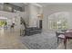 Spacious living room features high ceilings, abundant natural light, and an open floor plan at 1244 W Straford Ave, Gilbert, AZ 85233