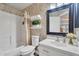 Cozy bathroom with floral wallpaper, bathtub and shower combo, and vanity sink at 1264 S Sierra St, Gilbert, AZ 85296
