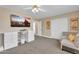 Well-lit bedroom offering a tv and built-in desk, creating a flexible space at 1264 S Sierra St, Gilbert, AZ 85296