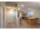 Inviting kitchen features stainless appliances and an open layout leading to the living area at 1563 E Peregrine Trl, Casa Grande, AZ 85122