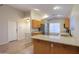 Well-lit kitchen features granite countertops and stainless steel appliances at 1563 E Peregrine Trl, Casa Grande, AZ 85122