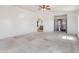 Main bedroom with open doorway and ceiling fan at 15985 W Bartlett Ave, Goodyear, AZ 85338