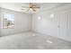 Bedroom featuring a ceiling fan, a window, and carpeted floors at 15985 W Bartlett Ave, Goodyear, AZ 85338