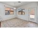 Bright breakfast nook with tile flooring and natural light streaming through windows at 15985 W Bartlett Ave, Goodyear, AZ 85338