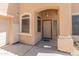 Covered front entryway with security camera at 15985 W Bartlett Ave, Goodyear, AZ 85338