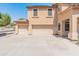 Spacious three-car garage and long concrete driveway at 15985 W Bartlett Ave, Goodyear, AZ 85338