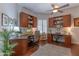 Spacious home office with built-in desks and cabinets, and ample workspace at 16436 S 1St Ave, Phoenix, AZ 85045
