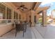 Covered patio with outdoor seating, ideal for entertaining or relaxing outdoors at 16436 S 1St Ave, Phoenix, AZ 85045