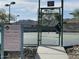 Tennis court at the Foothills Club West community, with visible tennis court rules at 16436 S 1St Ave, Phoenix, AZ 85045