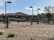 Outdoor sand volleyball court with net in the Foothills Club West community at 16436 S 1St Ave, Phoenix, AZ 85045