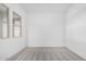 A vacant bedroom with plush gray carpeting and windows for natural light at 16455 W Avenida Del Sol --, Surprise, AZ 85387