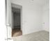 Bedroom features an en-suite bathroom and a sliding-door closet at 16455 W Avenida Del Sol --, Surprise, AZ 85387