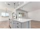 Spacious kitchen island with modern fixtures and an open layout, perfect for cooking and entertaining guests at 16455 W Avenida Del Sol --, Surprise, AZ 85387