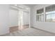 A bright and airy living room that features both tile and carpeted flooring at 16455 W Avenida Del Sol --, Surprise, AZ 85387