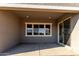 Covered patio featuring a smooth concrete surface and a large window overlooking the yard at 16455 W Avenida Del Sol --, Surprise, AZ 85387