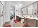 Bright bathroom featuring double sinks and neutral color palette at 17003 W Alameda Rd, Surprise, AZ 85387