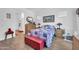 Cozy bedroom with wood-look tile flooring and lots of natural light at 17003 W Alameda Rd, Surprise, AZ 85387