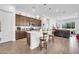 Modern kitchen with a large island, stainless steel appliances, and an open layout at 17003 W Alameda Rd, Surprise, AZ 85387