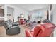 Bright, open-concept living area with lots of seating and natural light at 17003 W Alameda Rd, Surprise, AZ 85387