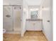 Bathroom boasts tiled floors, a shower, and a well-lit vanity at 1712 E Manhatton Dr, Tempe, AZ 85282